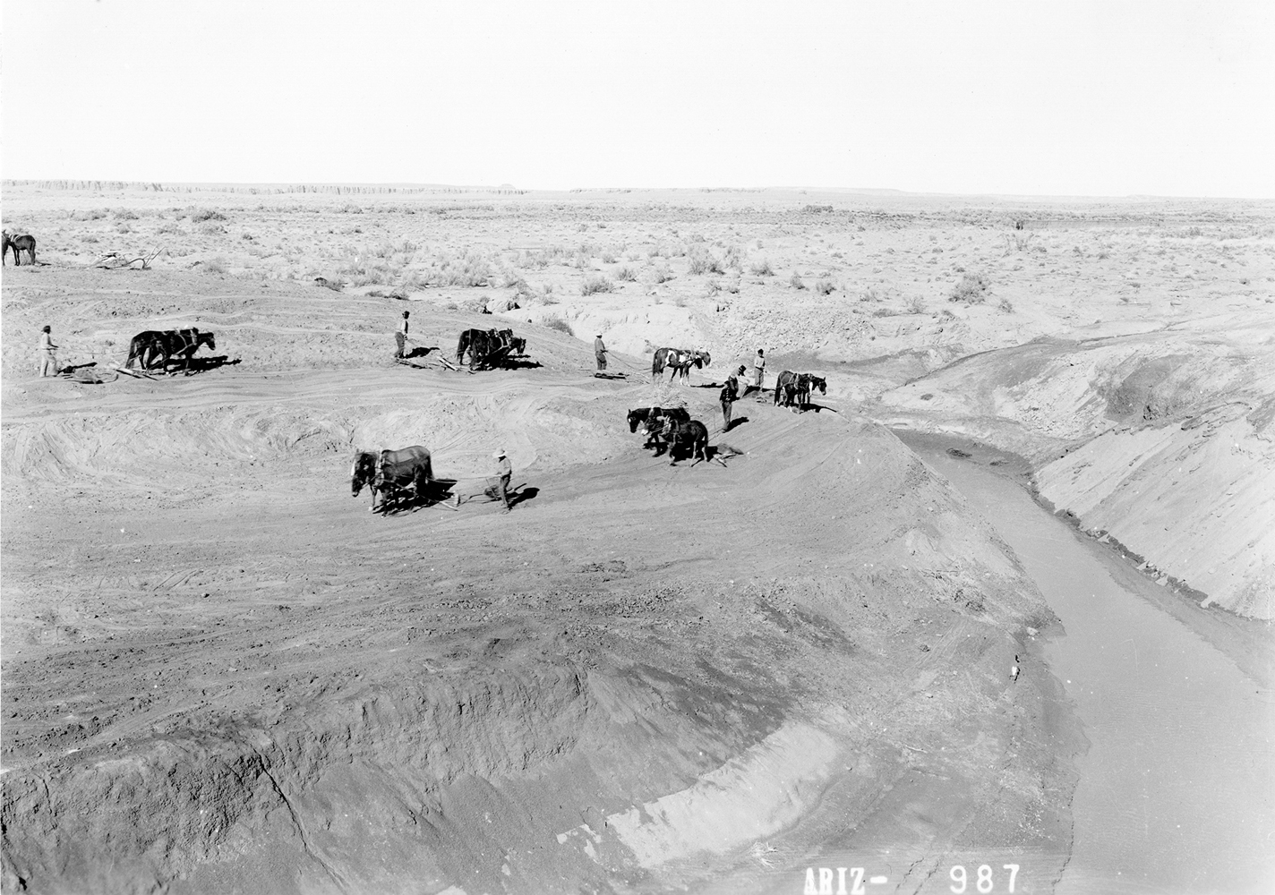 Historical photograph by Milton Snow of an irrigation wash in the Navajo Nation. An anthropology museum in Albuquerque is working to fill in the gaps outside the frame.