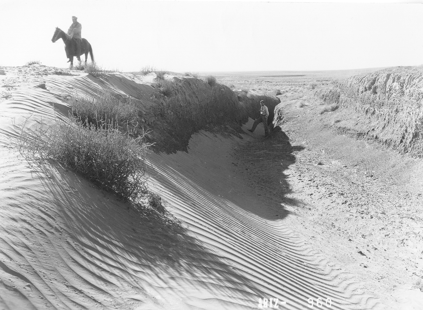 Historical photograph by Milton Snow of a diversion channel on the Navajo Nation. An Albuquerque anthropology museum is working to fill in the gaps outside the frame.