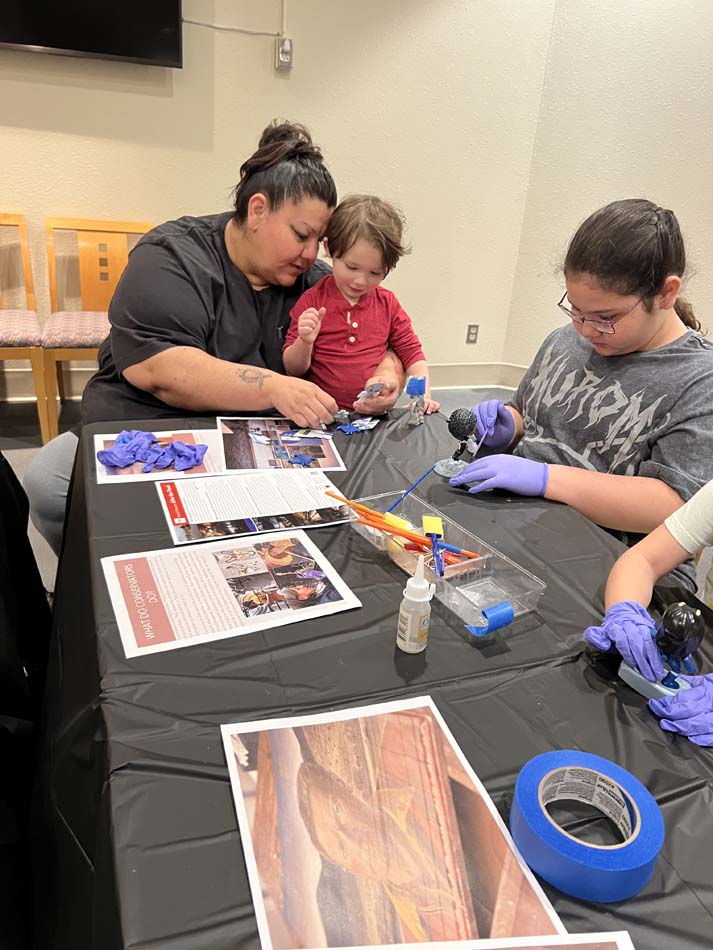 Children repairing broken toys with glue