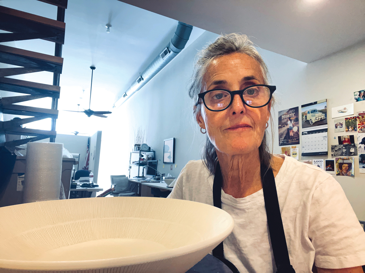 Artist Kathleen Royster in her ceramics studio in Helper, Utah.