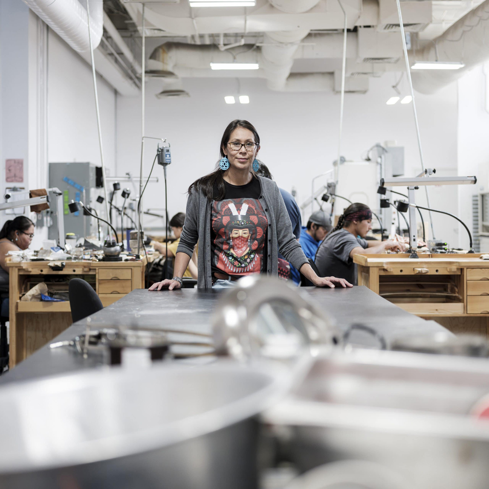 An artist in the jewelry studio at IAIA, just one of the Southwest Artist Residencies with Summer 2025 submission deadlines.