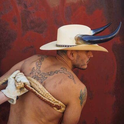 color photograph of José Villalobos’s naked back and torso bound with rope