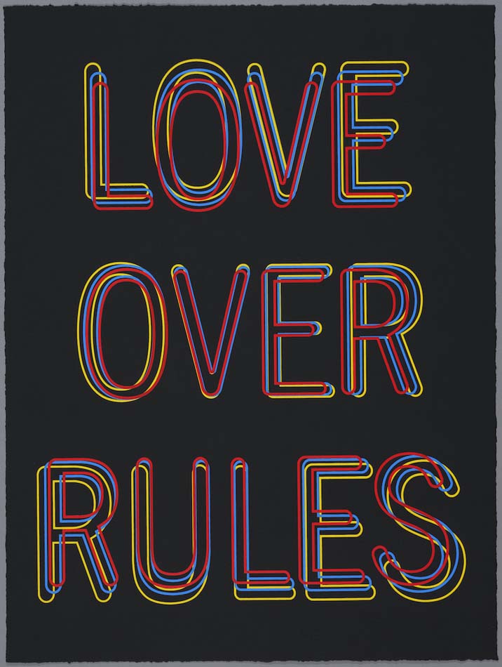 The words Love Over Rules in colorful block letters on a black background.