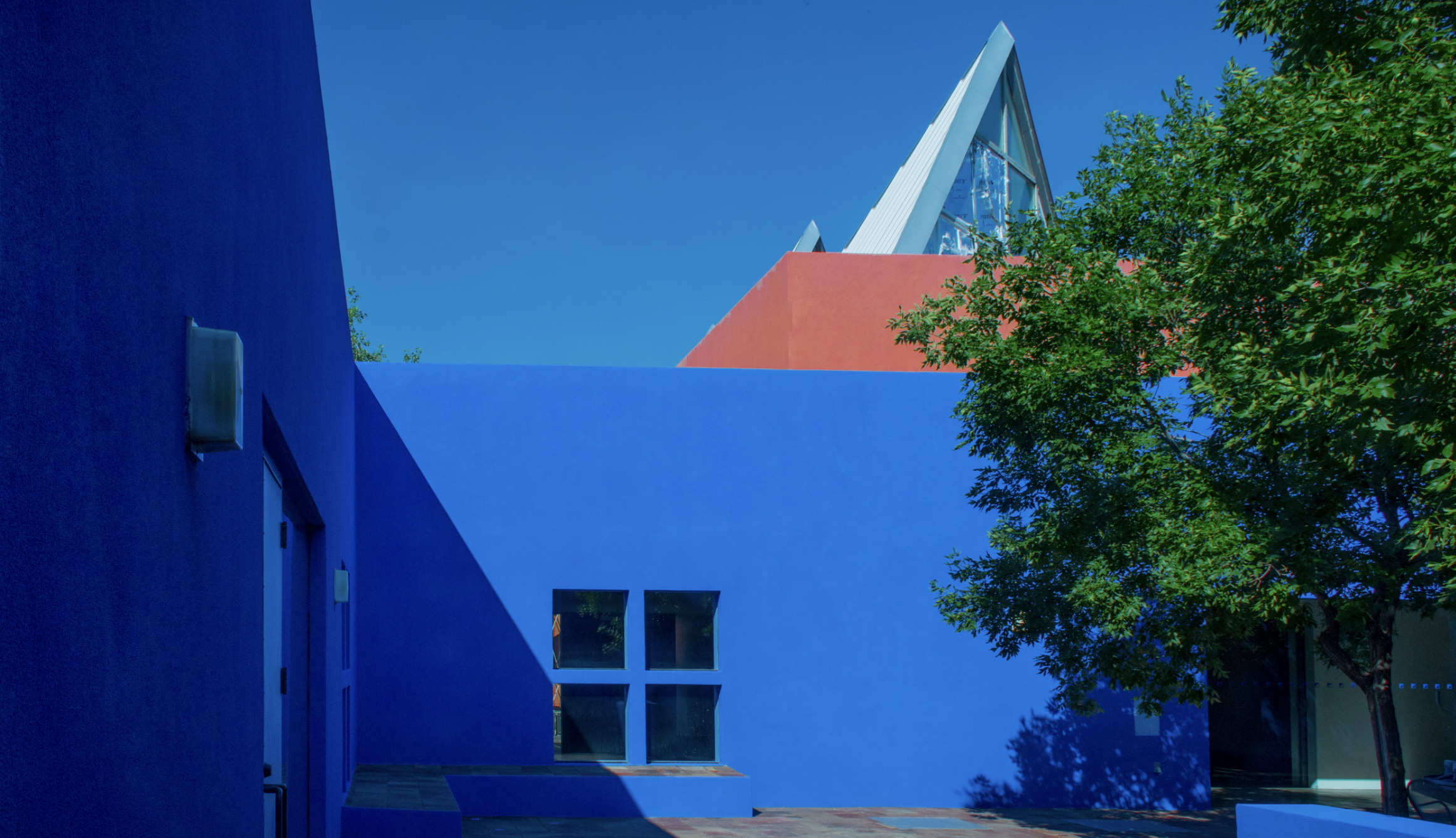 Bright blue courtyard at Santa Fe Art Institute.