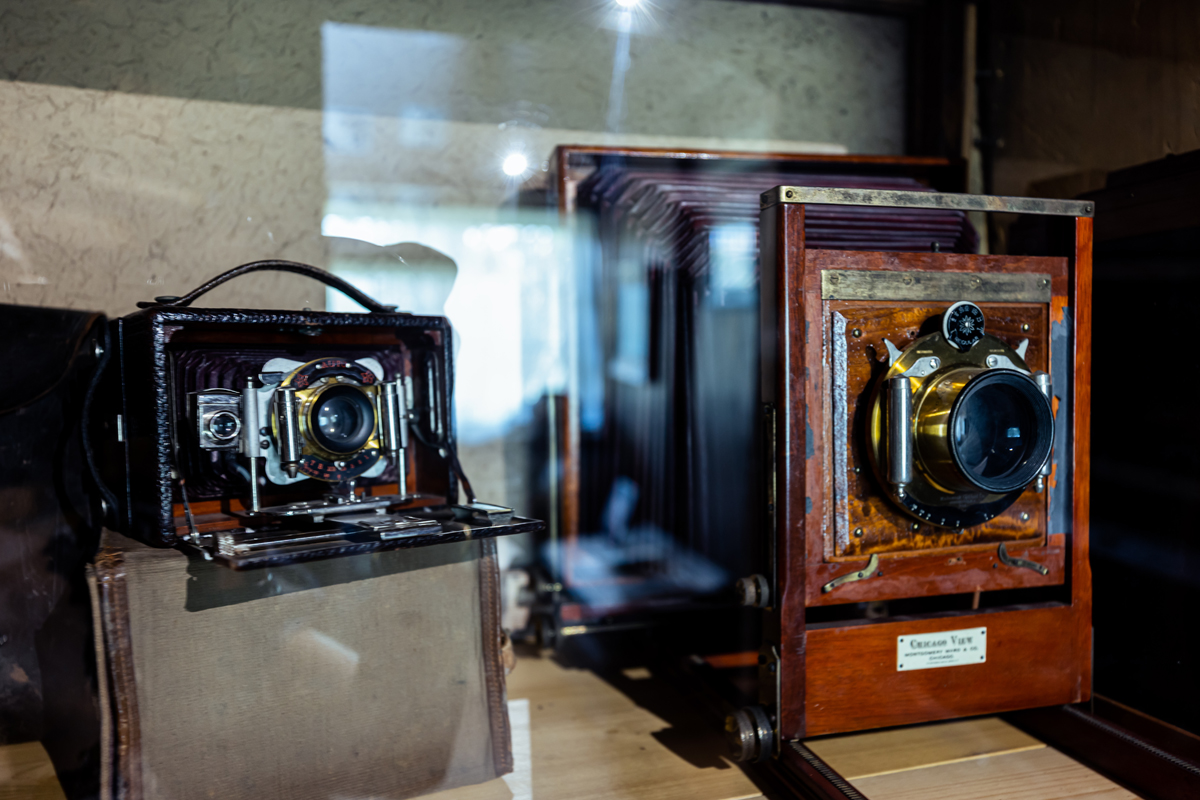Two antique cameras.