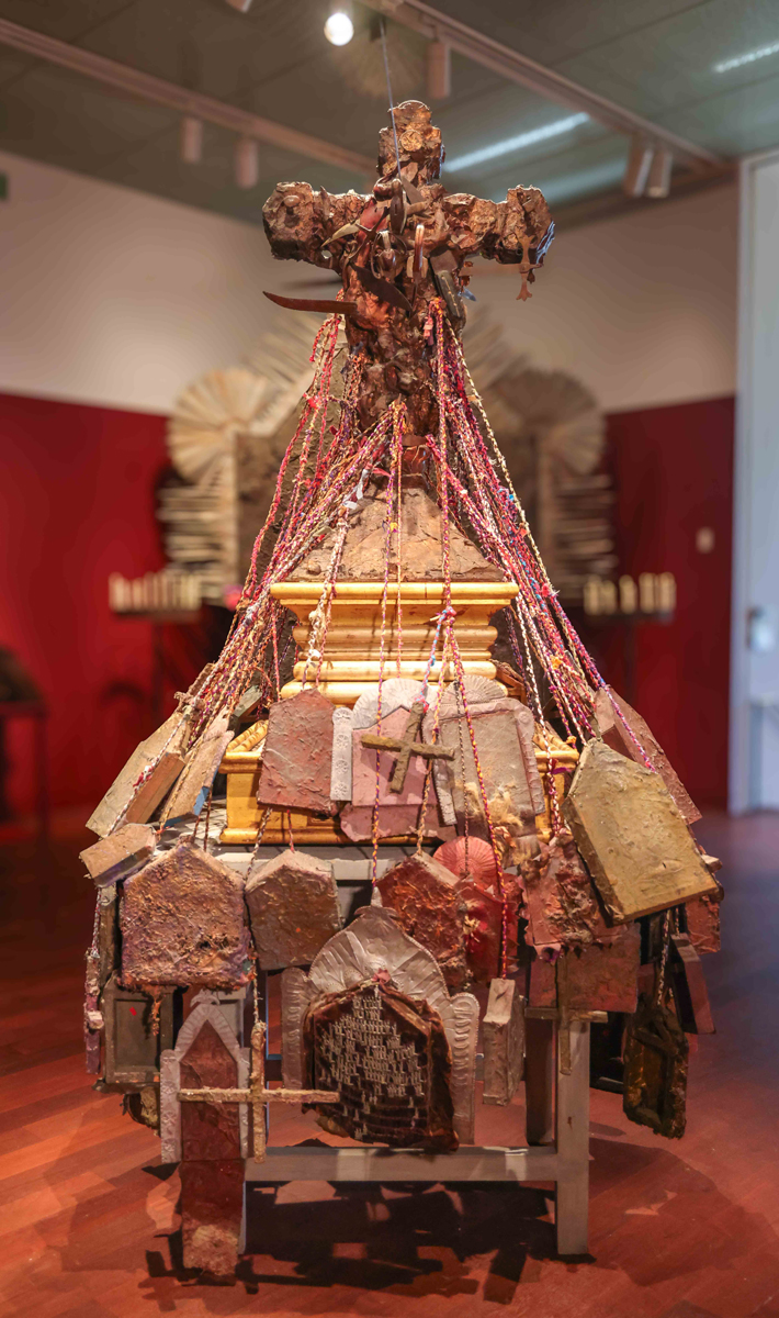 Monumental sculptural work incorporating a crucifix form by Michael Tracy.
