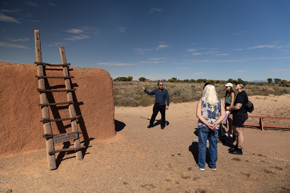 A volunteer leads a guided tour of Coronado Historic Site