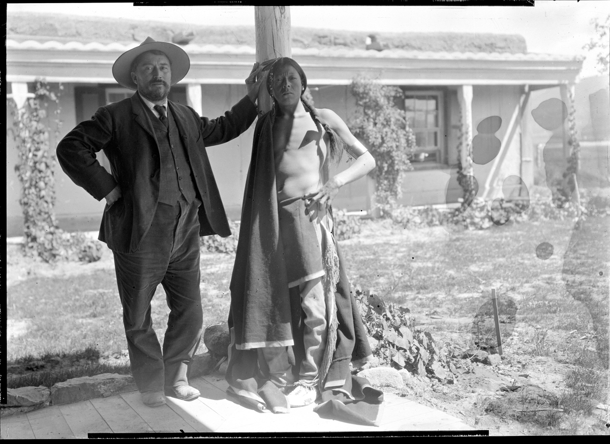 Black-and-white photograph of painter Eanger Irving Couse with Ben Lujan of Taos Pueblo.