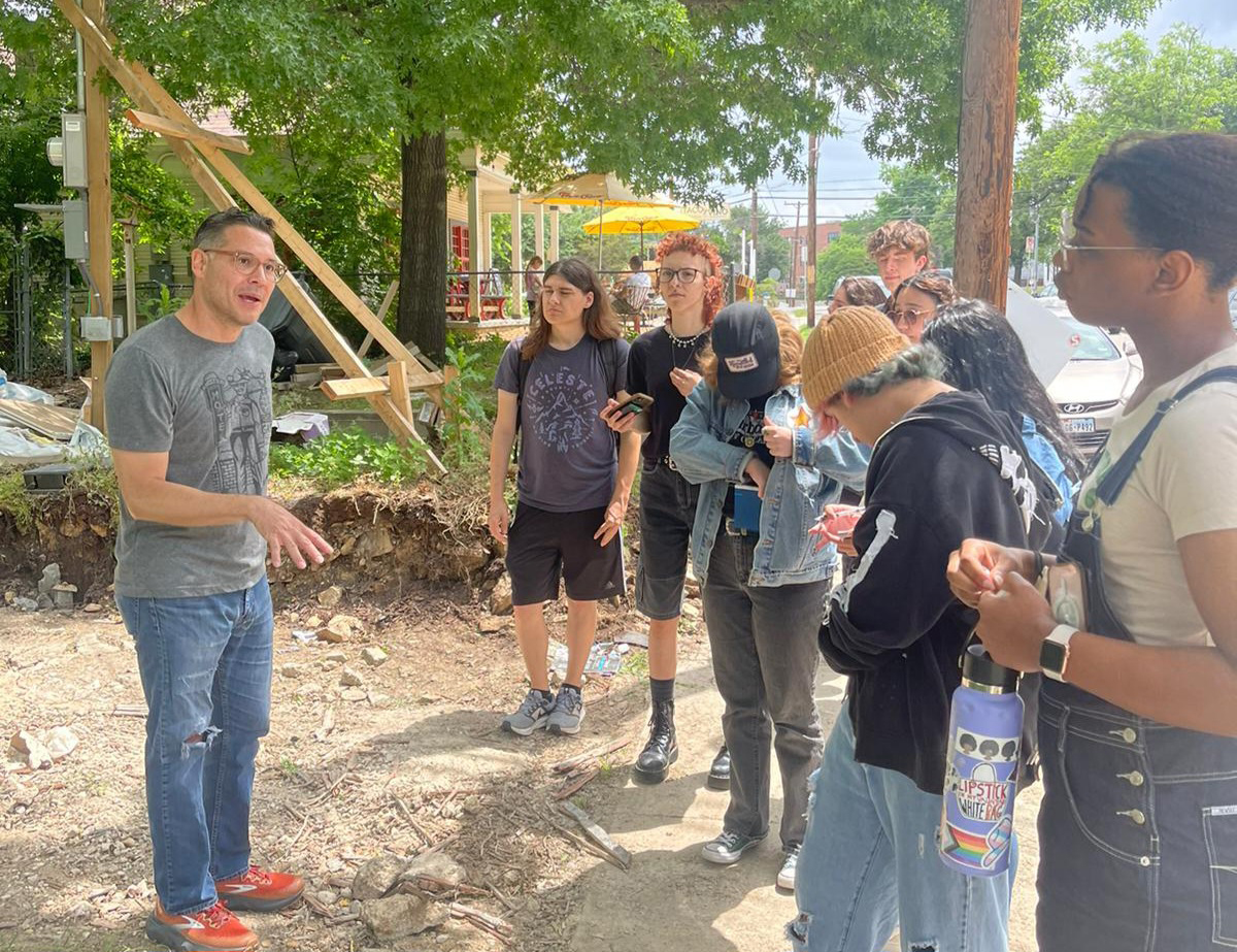 Giovanni Valderas puts the Texas Housing Crisis into perspective during a gentrification walking tour.