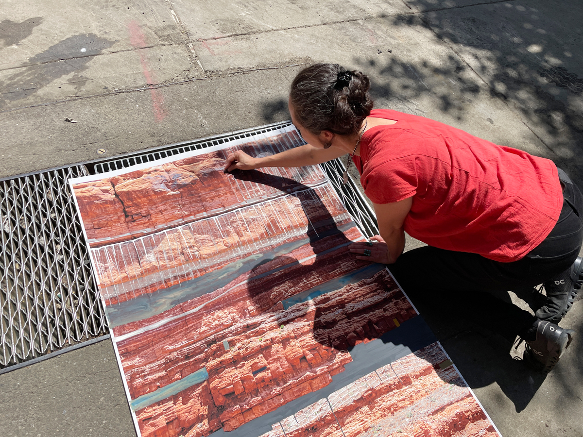 Multidisciplinary artist Nicola López creates an artwork on a Santa Fe sidewalk.