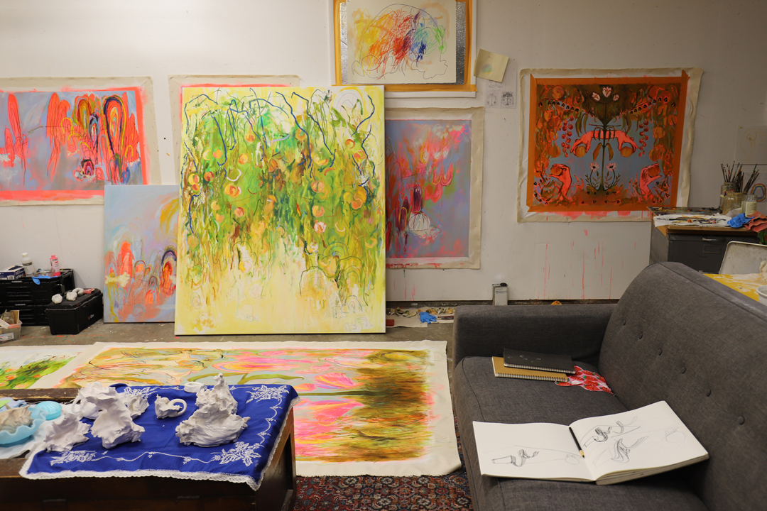 Colorful artworks fill the Denver art studio of Kaitlyn Tucek, a multidisciplinary artist.
