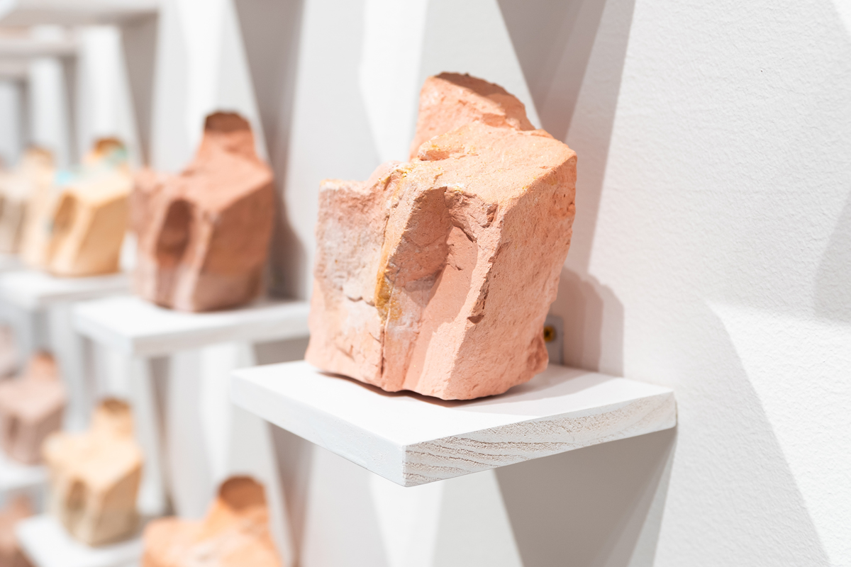 Sculptural installation featuring gypsum cement and pigment by Erika Lynne Hanson.