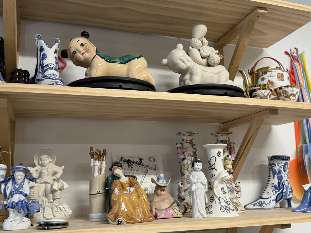 Porcelain figurines line shelves in Arizona artist Jennifer Ling Datchuk's studio.