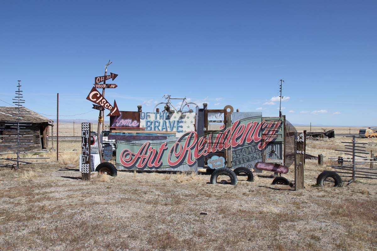 Sign for The Home of the Brave artist residency in Cisco, Utah