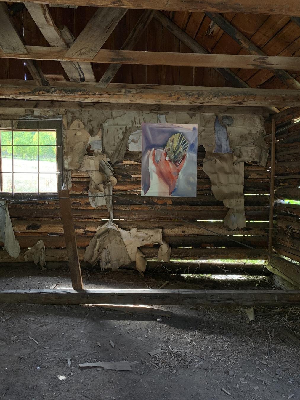 Ghostly installation view of Kaitlyn Tucek's The Lilac Hour, which took place in an abandoned Colorado village.