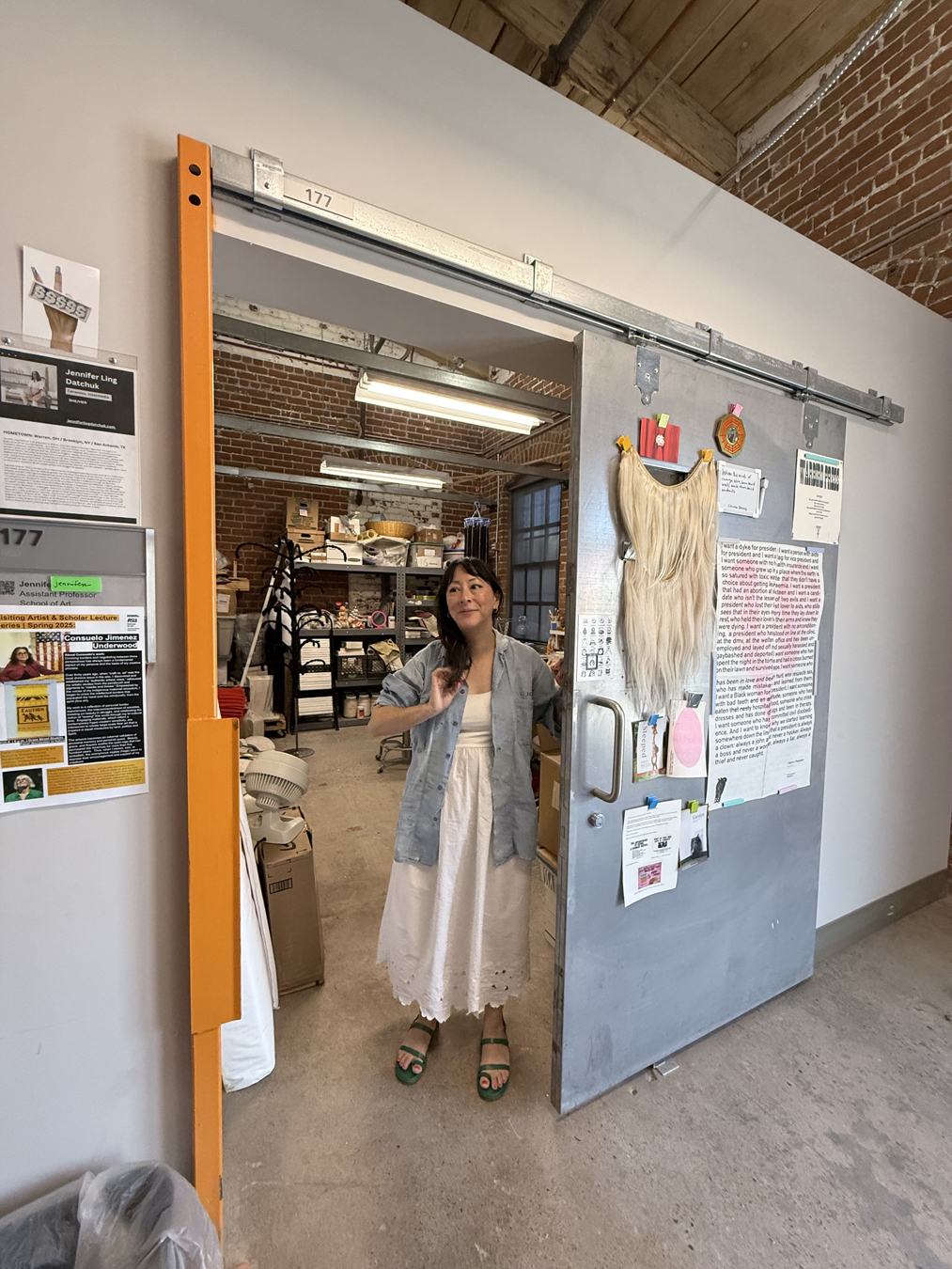 Interdisciplinary artist Jennifer Ling Datchuk peers out of her Phoenix art studio.