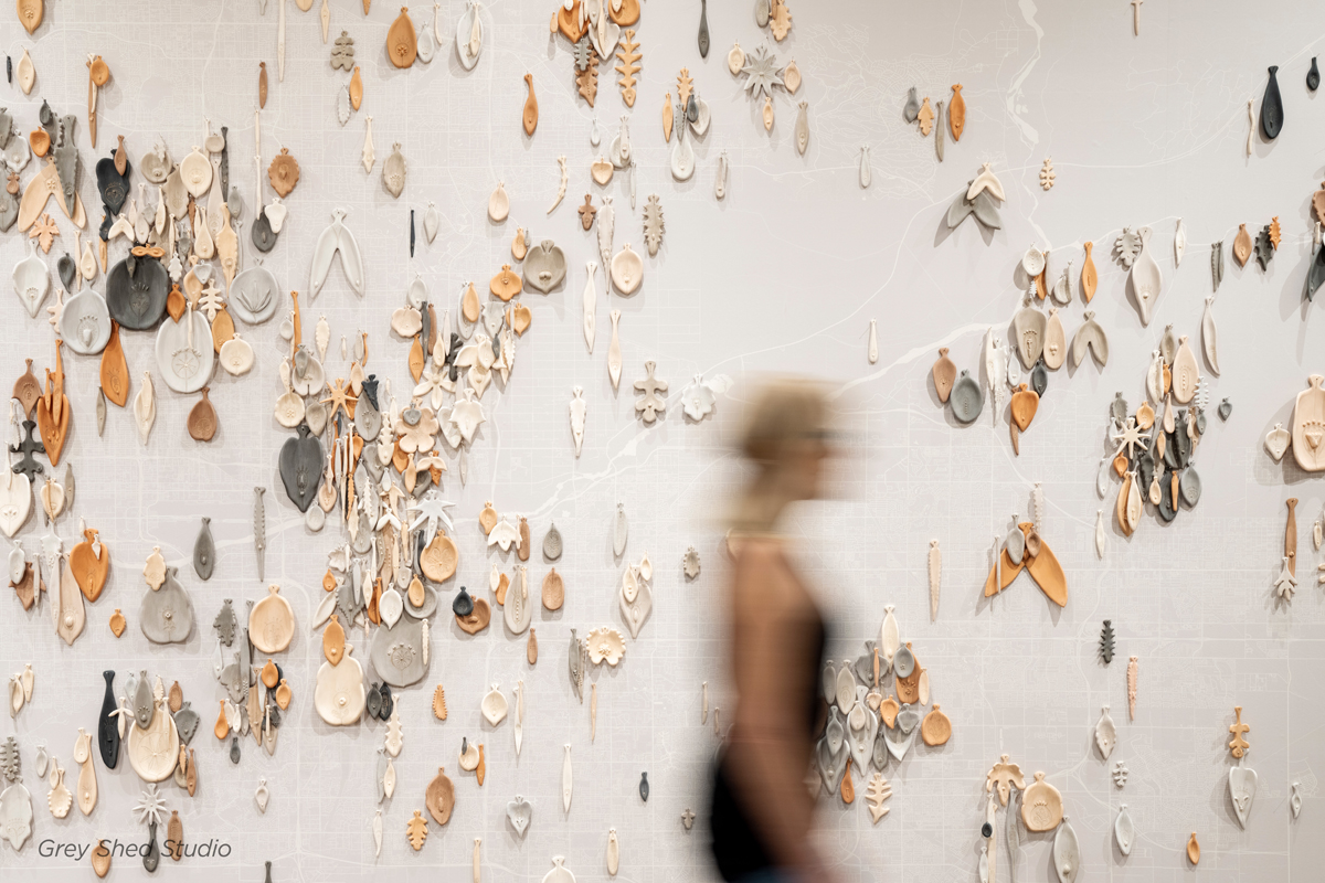 Visitors wanders through a leaf-inspired installation by Mary Meyer in Phoenix.