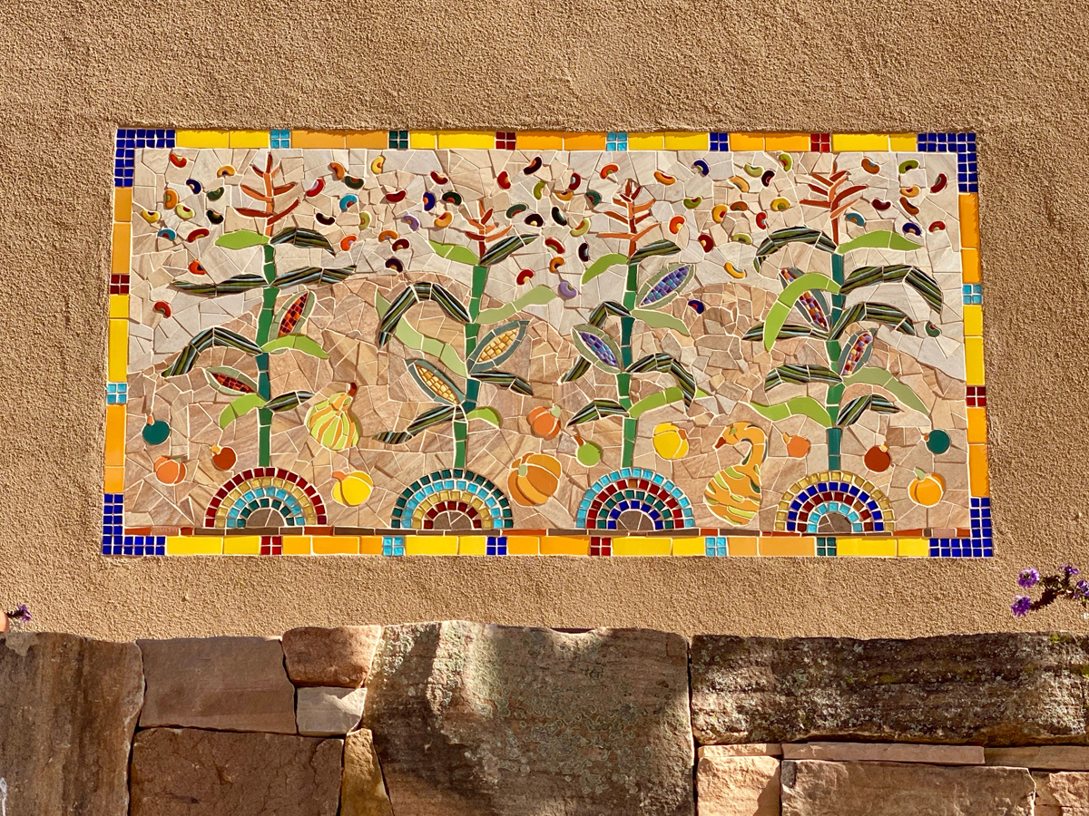 Mosaic showing harvest crops at the Santa Fe Botanical Garden.