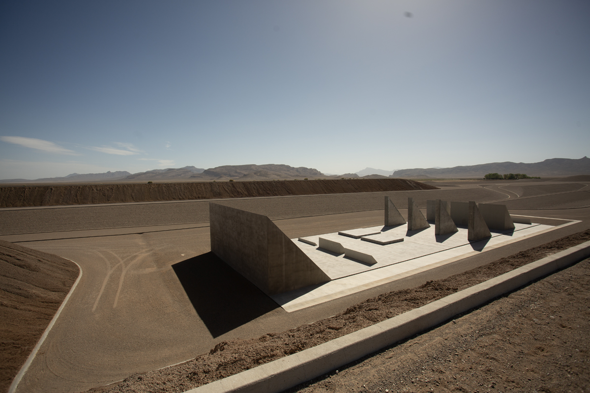 Photograph of Michael Heizer's land art titled City, located in the Nevada desert.