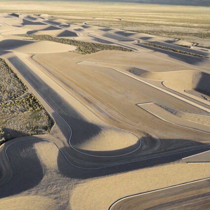 Aerial shot of Michael Heizer's land art titled City in the Nevada desert.