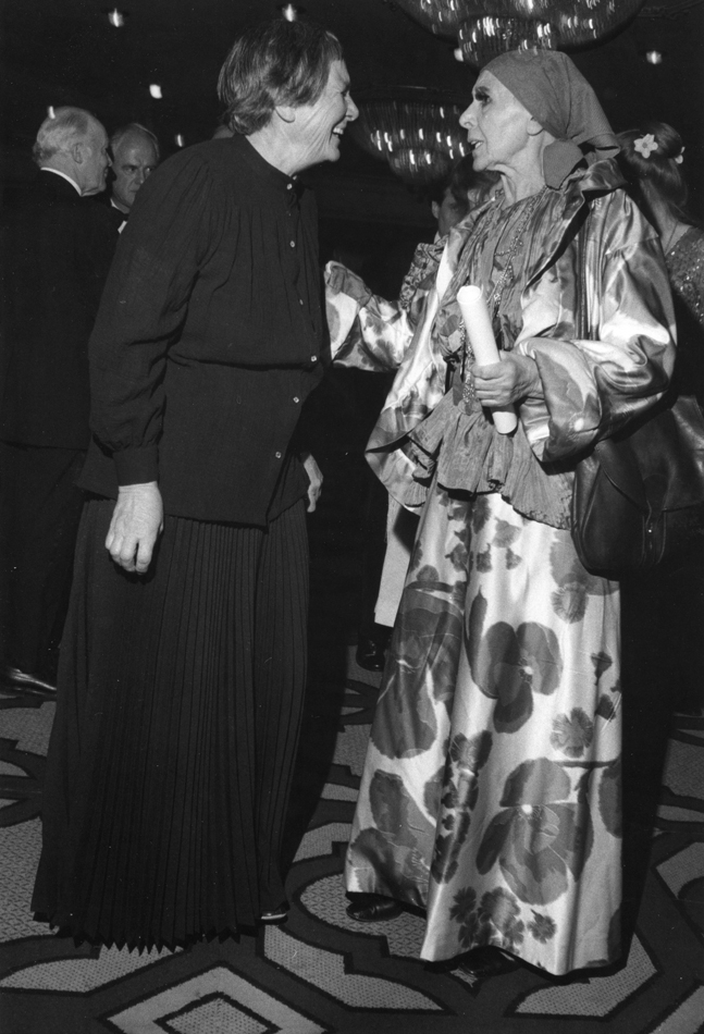 Agnes Martin laughs with Louise Nevelson at a party in the 1970s.