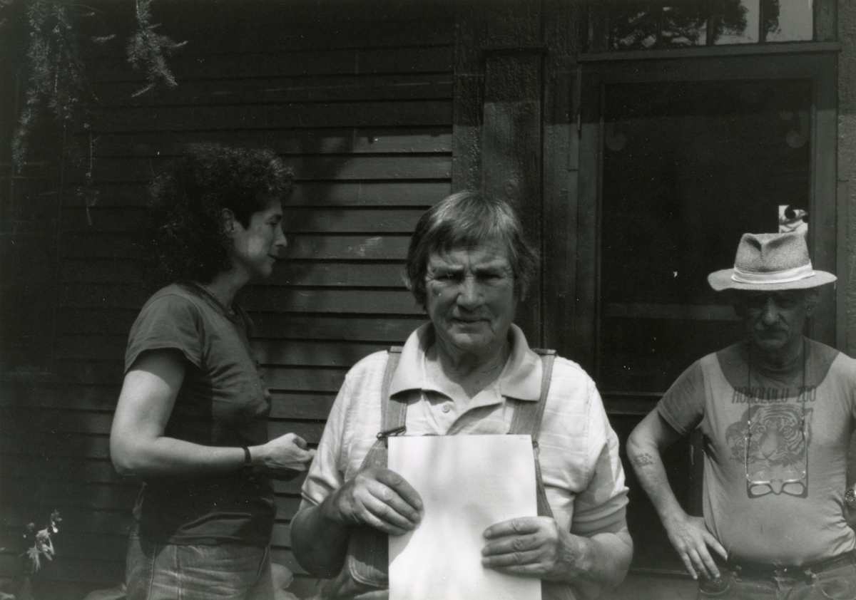 Agnes Martin preparing to give a lecture.