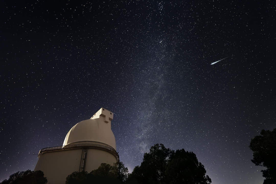 Still from a digital video by artist Virginia L. Montgomery showing an observatory under the stars.