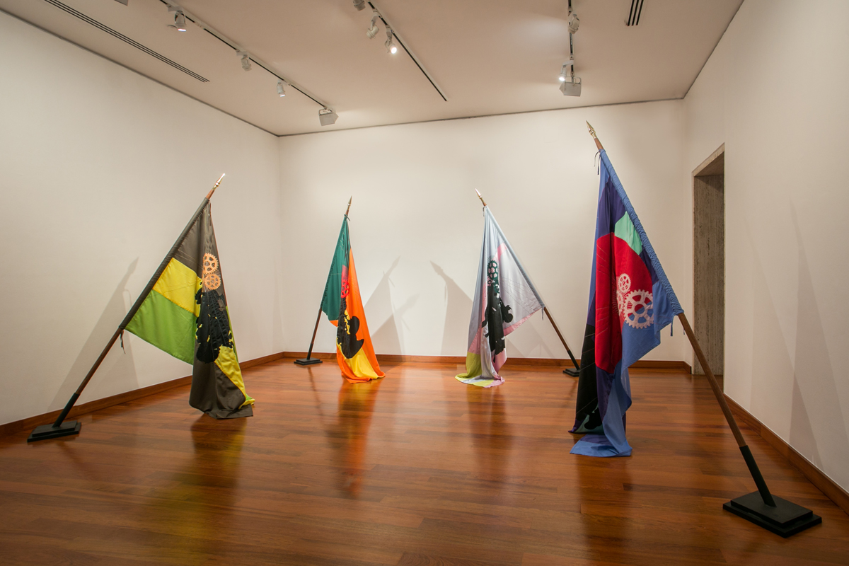 Installation featuring a circle of flags by Erick Meyenberg, curated by Gabriela Rangel.