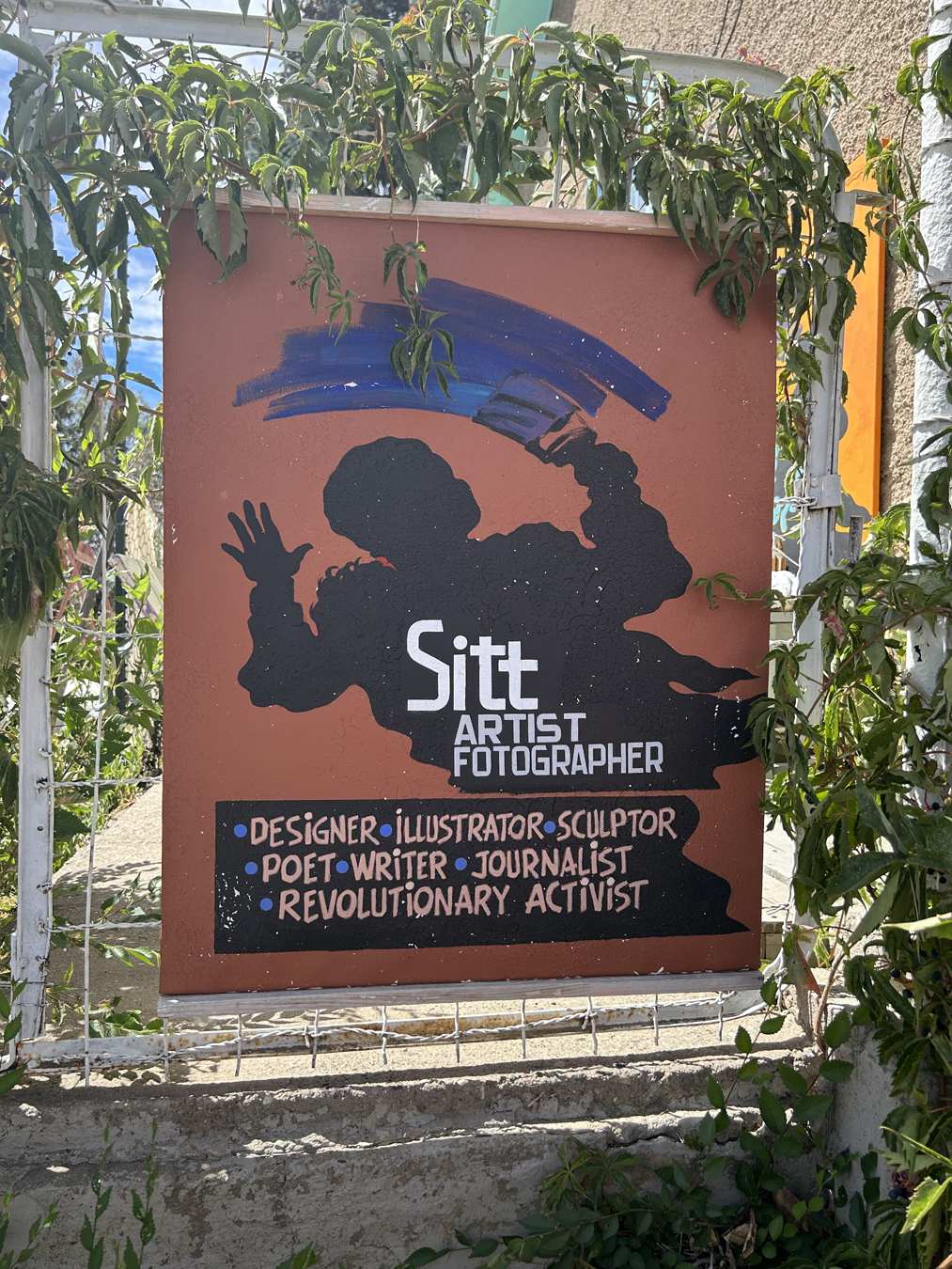Sign outside Sitt Nyein Aye's studio that reads 