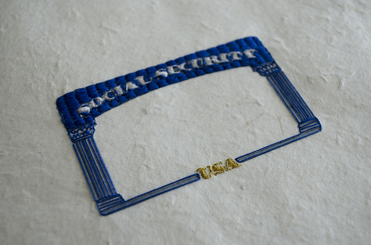 Embroidered image of a social security card by Utah-based artist Nancy Rivera.