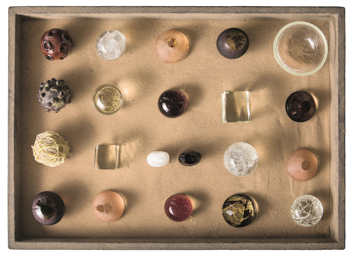 A glass artwork by Judy Tuwaletstiwa, part of Abstracting Nature at Albuquerque Museum.