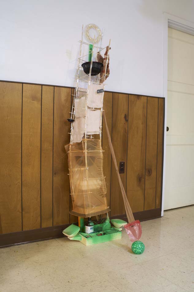 Sculpture by Taylor Engel leaning against a wall.