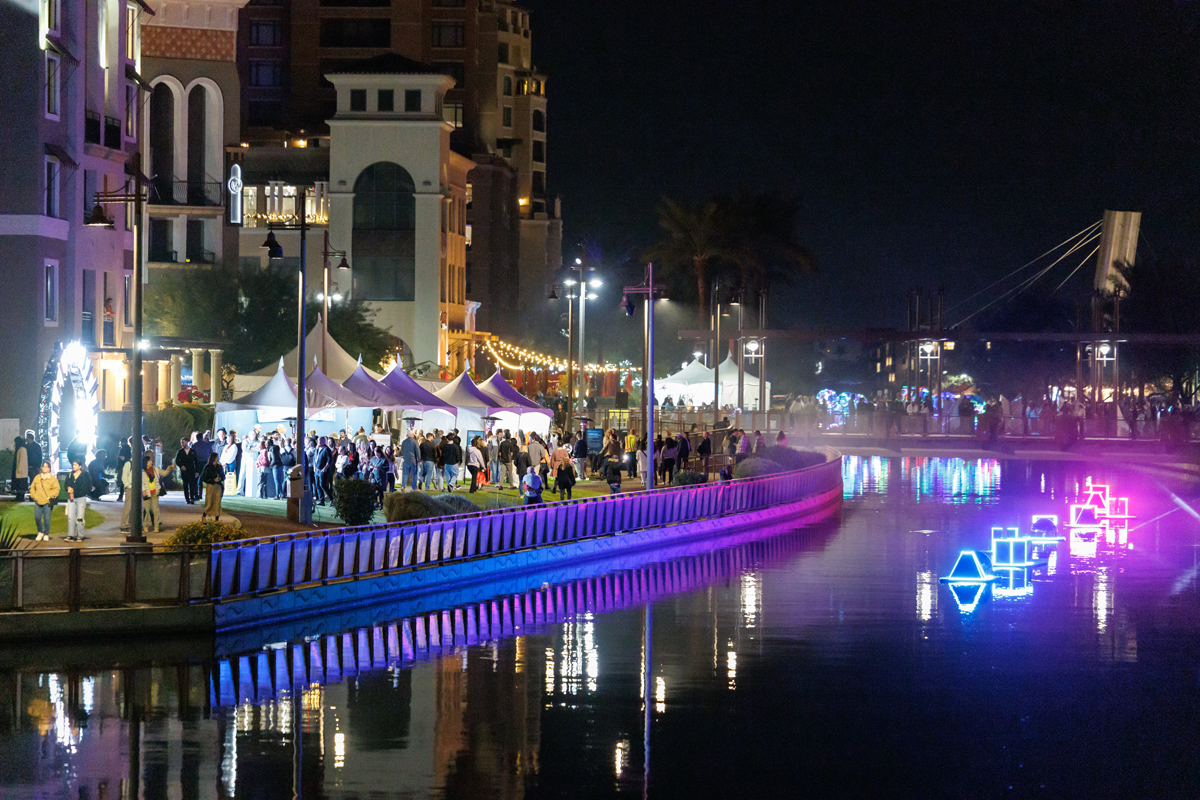 Stunning new media art shimmers above a canal in Scottsdale during Canal Convergence, a must-see stop in the Arizona Art Guide for winter.