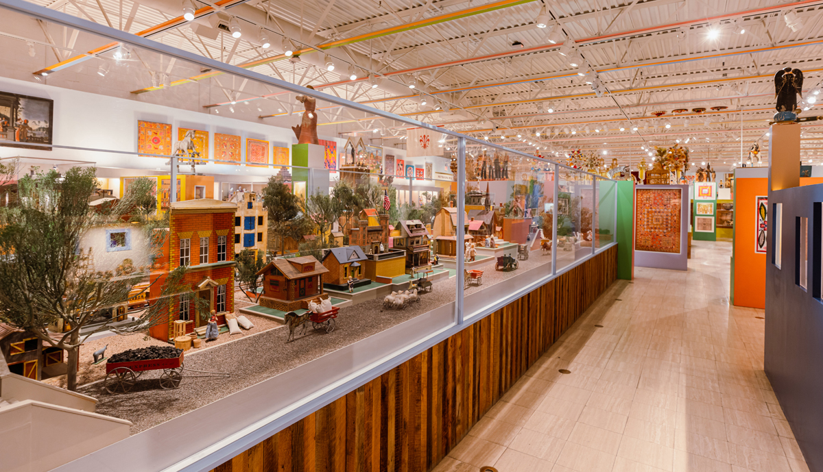 Sprawling display cases in Multiple Visions: A Common Bond, a folk art exhibition designed by Alexander Girard in Santa Fe.