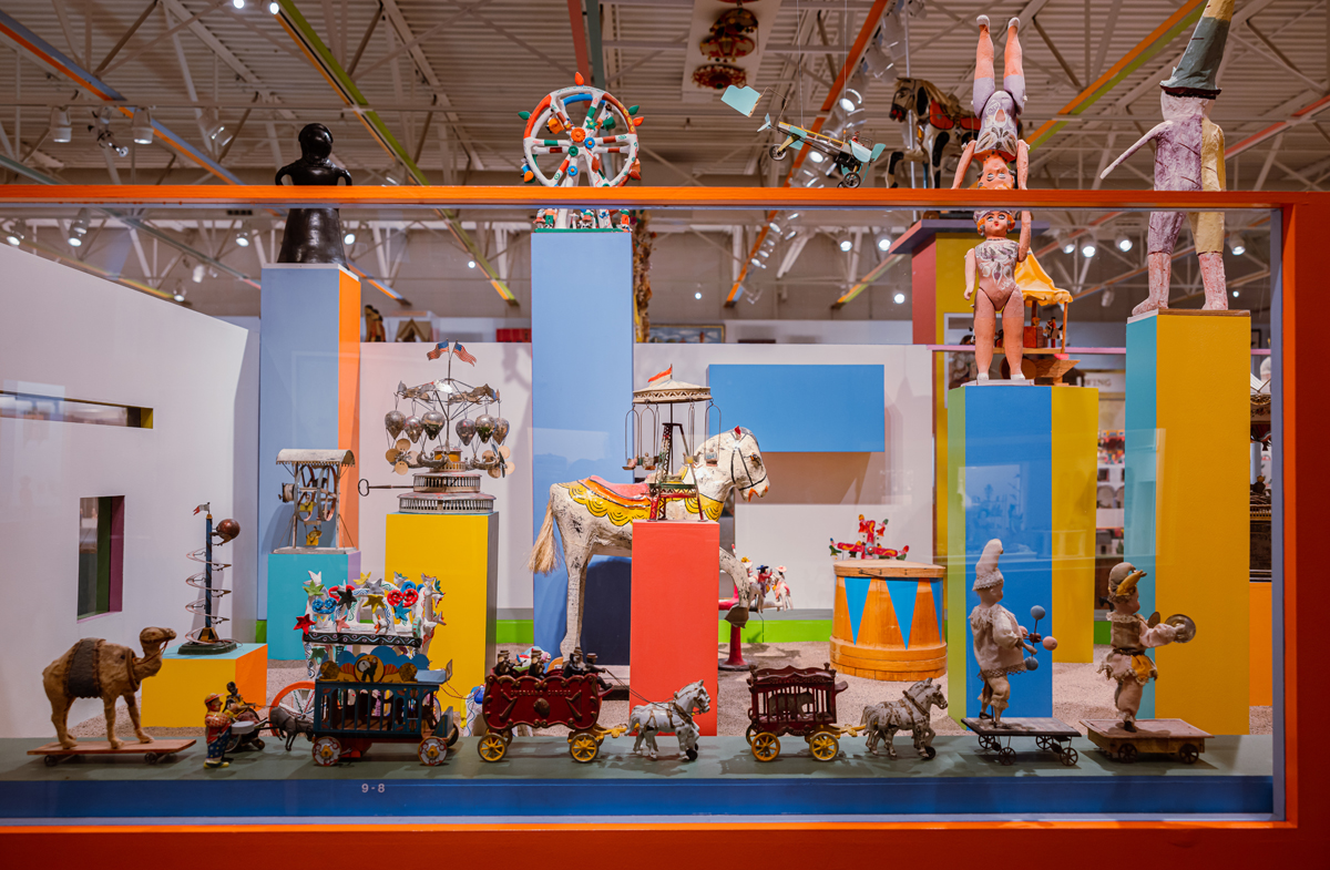 A display case full of circus-themed toys in the Alexander Girard wing at Museum of International Folk Art.