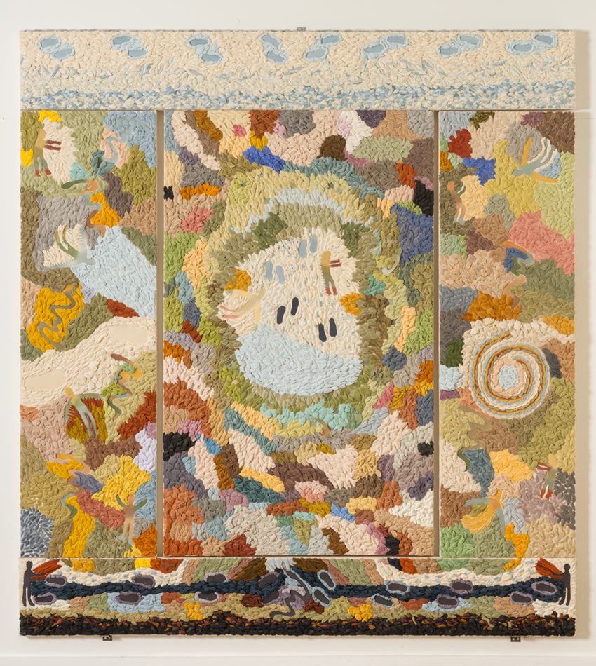 A multi-paneled artwork, Garden of Dreams I, by Judy Tuwaletstiwa made of individual multi-colored pieces of kiln-fired glass.