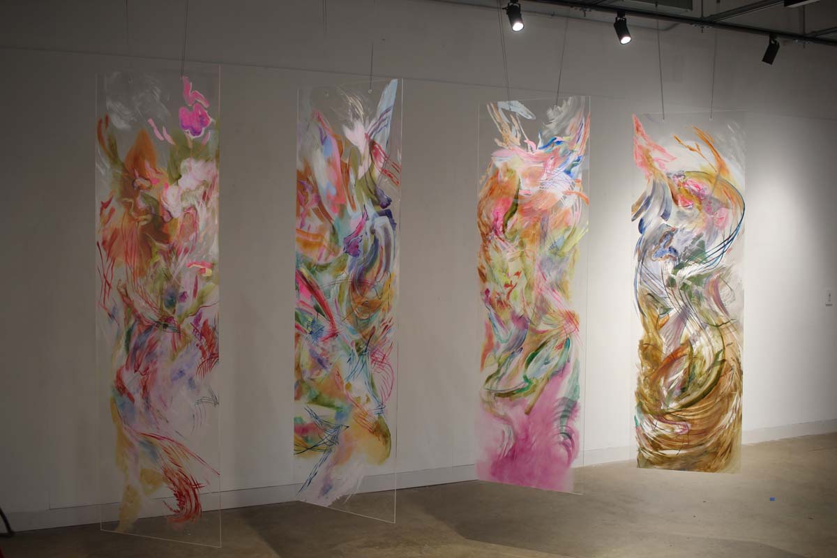 Four oil on panel works by Alicia Parham hanging in a gallery space.