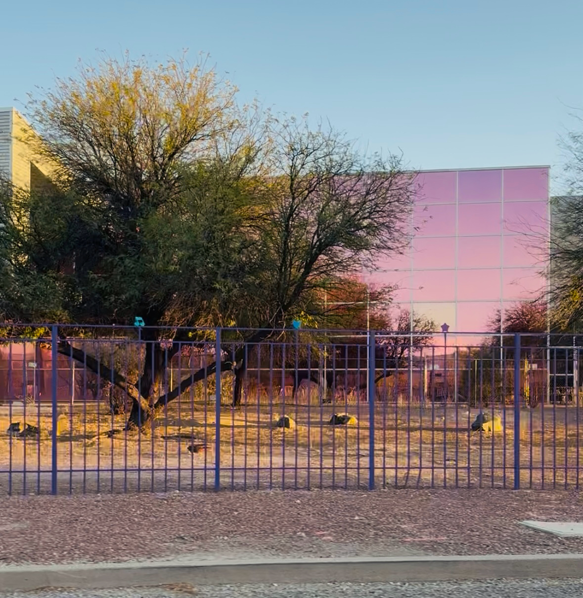 The rose-colored glass windows of the Lisa Frank warehouse in 2025.