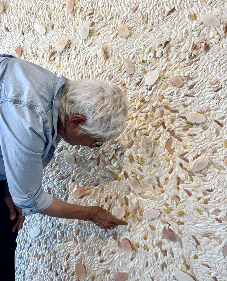Judy Tuwaletstiwa working in her studio. 