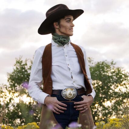 Artist Luca Berkley dressed as the drag king cowboy character Jack Lope.