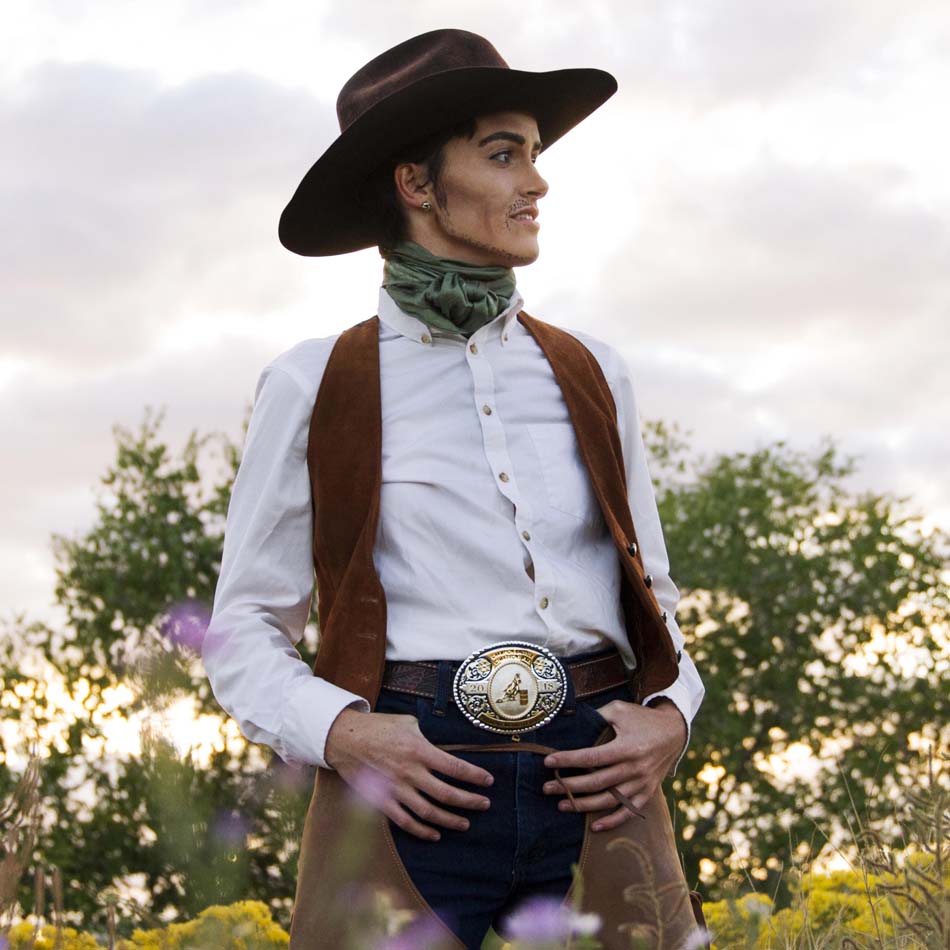 Artist Luca Berkley dressed as the drag king cowboy character Jack Lope.