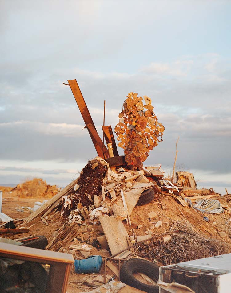 West Texas trash heap in the setting sun, with Phoebe Shuman-Goodier's Rust Shroud