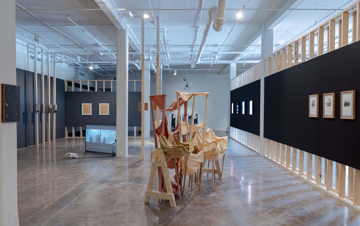 Installation view of In the Shadows Our Ghosts Lurk (En Las Sombras, Nuestros Fantasmas Acechan) at Contemporary at Blue Star, San Antonio.