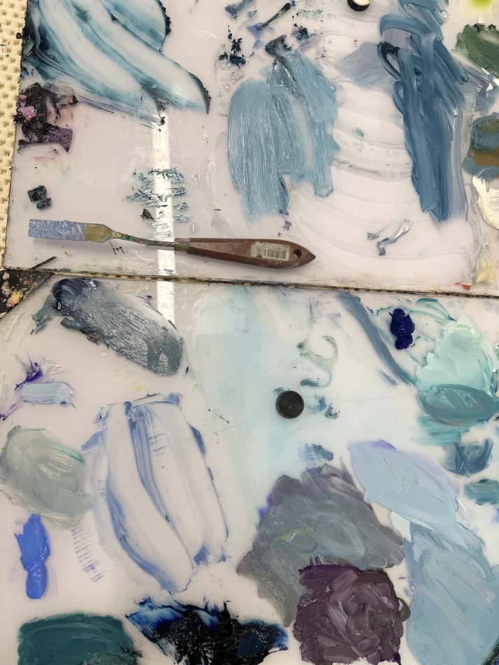 Paint palette with shades of blue.