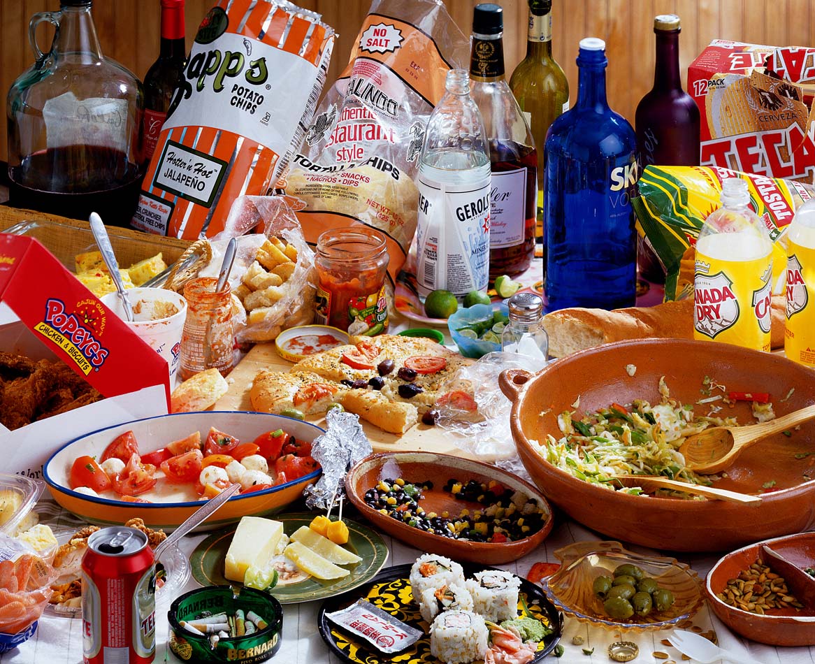 A photograph by Chuck Ramirez of a table of snacks at a Super Bowl Party.