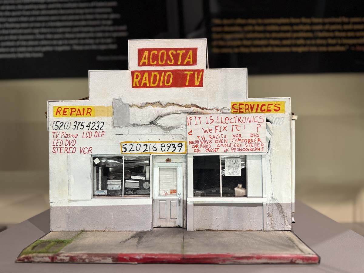 Artist Jorge Ruiz crafted this miniature of Acosta Radio TV, an electronics business with hand-painted signage.