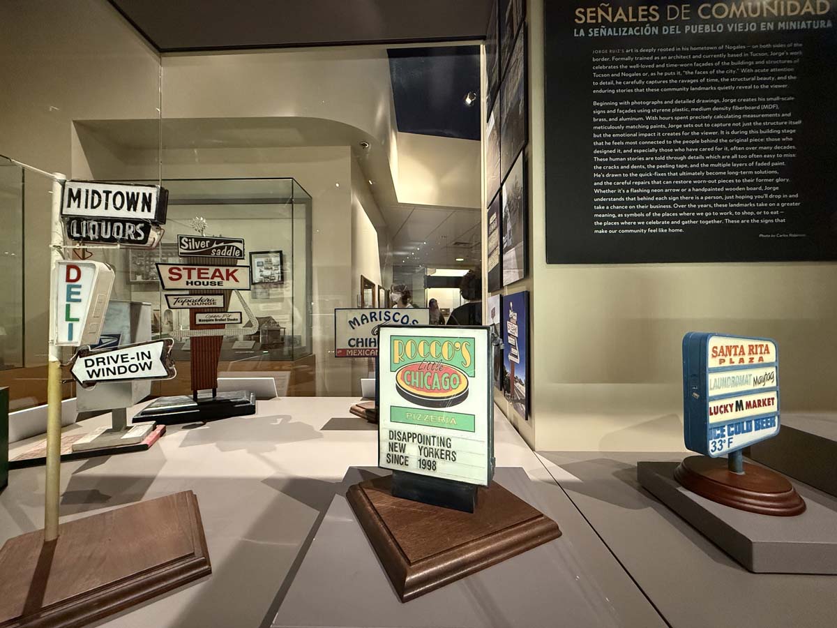 Miniature signs in Jorge Ruiz's exhibition at the Mini Time Machine Museum of Miniatures in Tucson.