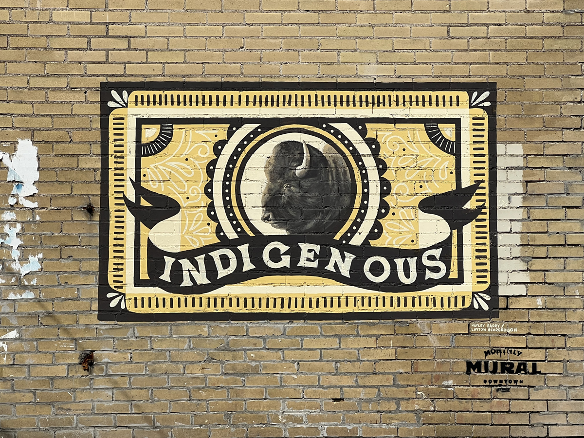 Mural by Hayley Barry featuring a buffalo head and the word "Indigenous" in Provo, Utah, part of the best Southwest Mural Guide.