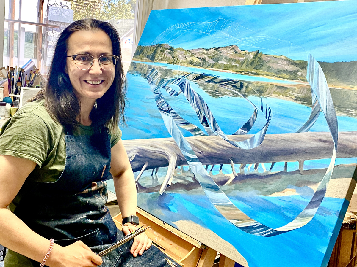 Portrait of artist Rossitza Todoroava with her artwork.