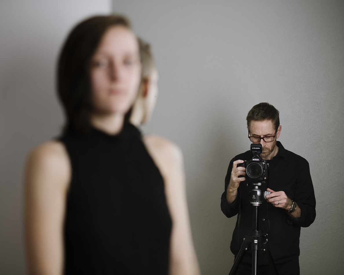 Portrait of photographer Carl Bower at work. He weighs in on how to price your art.